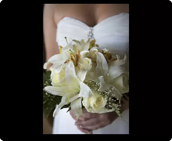 Caribbean, Dominican Republic, Punta Cana, Bavaro, bride holding wedding bouquet, MR