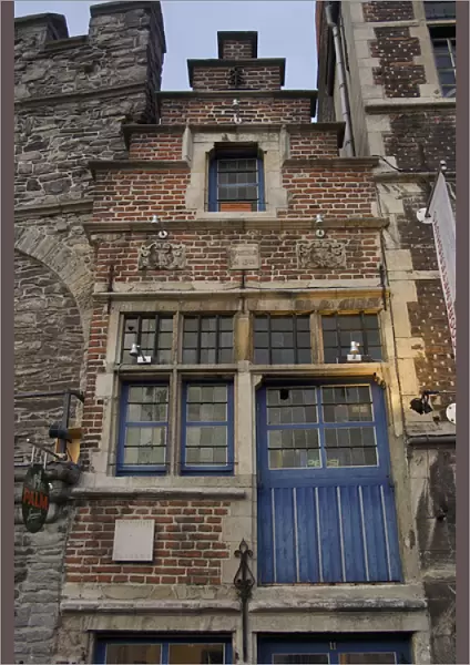 Europe, Belgium, Ghent. A narrow brick structure squeezed among Ghents historic