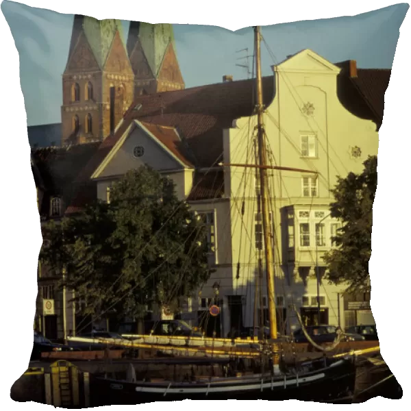 Europe, Germany, Lubeck. St. Marien church and twin towers behind houses facing the