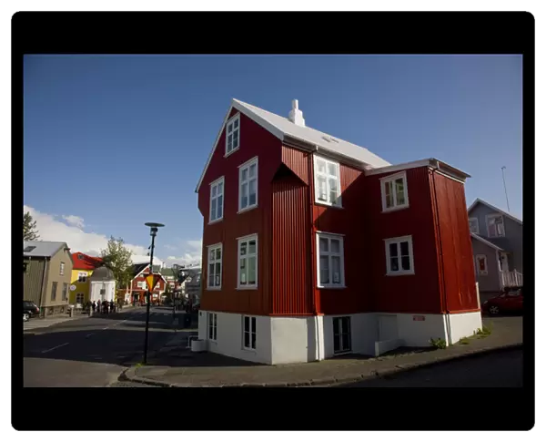 Europe, Iceland, Reykjavik. A red, metal-siding building being used as a gallery