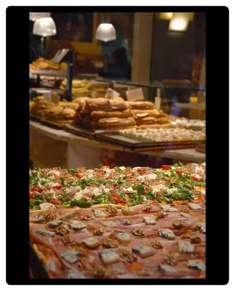 04. Italy, Bergamo, pizza and sandwiches inside bakery (Editorial Usage Only)