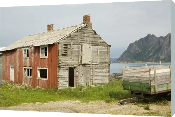 Europe, Norway, Vesteralen. Old weather worn building in Hovden