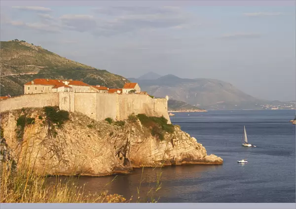 A view of the Lovrijenac Fort and the sea, mountains in the background Dubrovnik, old city