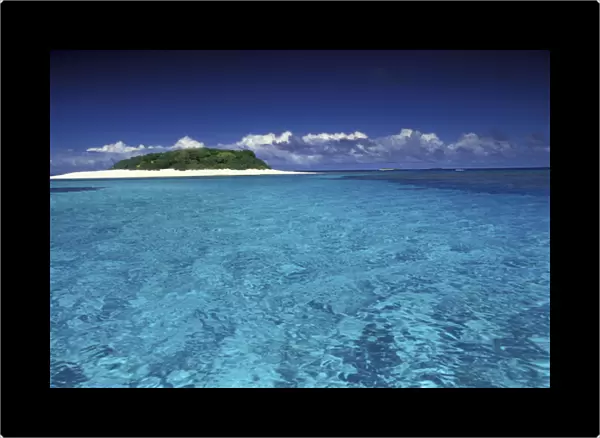 Tonga Islet with white sand and ocean
