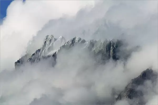 Landscape of Cuernos del Paine shrouded in clouds, Torres del Paine National Park