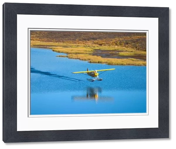 N. A. USA, Alaska. Float plane on lake along the Denali Highway