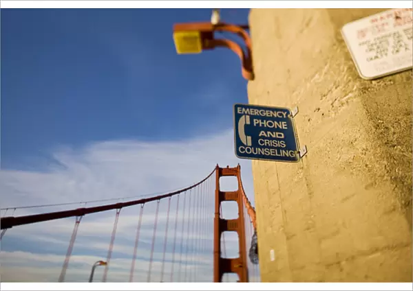 Emergency Phone and Crisis Counseling sign on the Golden Gate Bridge - San Francisco