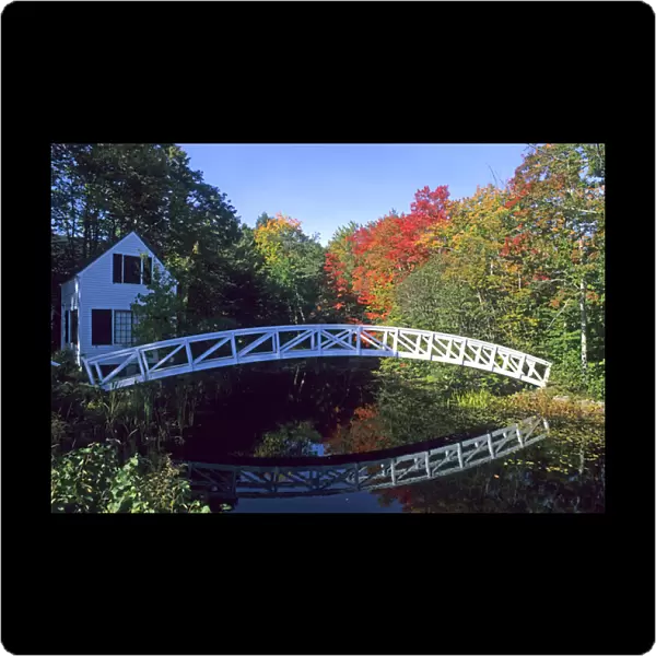Colorful New England Scene of a Curved Bridge And Water in Somersville Maine