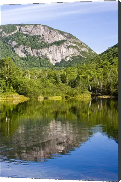 The cliffs of Mount Willey as seen from Willey Pond in New Hampshires Crawford