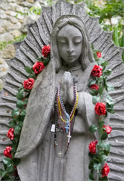 USA, Texas, Statue of the Virgin of Guadalupe at mission San Juan Capistrano founded