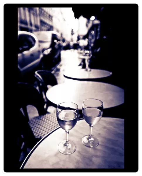 Wine glasses at an outdoor cafe, Paris, France