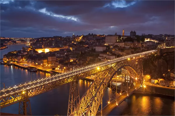 Europe, Portugal, Porto. Dom Luis I Bridge lit at night