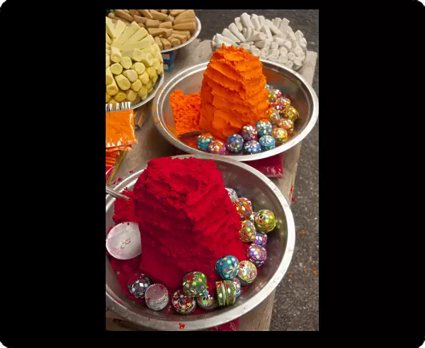 Bright red and orange tikka powder, Pushkar, Rajasthan, India