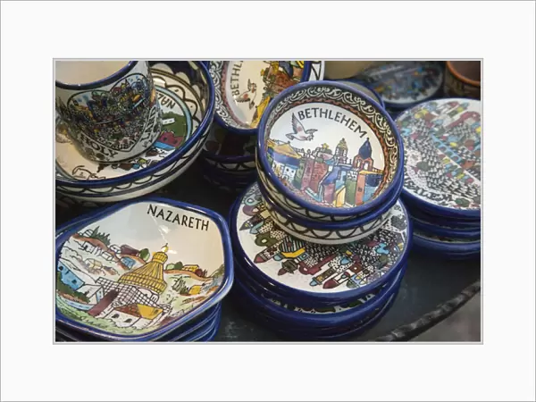Local ceramic ware with Biblical themes on Nazareth, Israel sidewalk