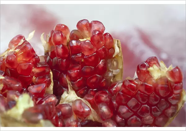 Thailand, Bangkok. Fresh pomegranate on ice sold on the street raw or made into juice