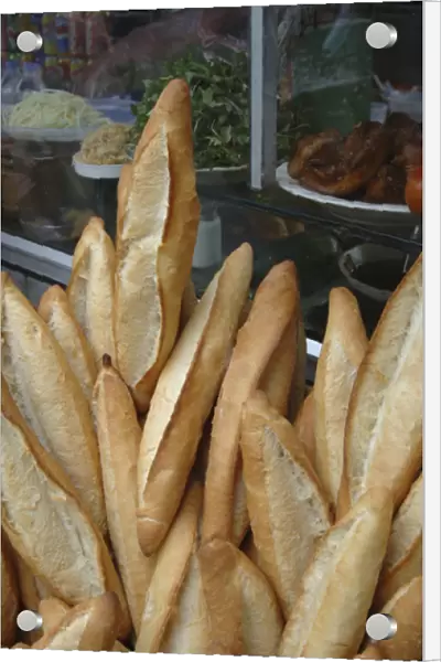 Asia, Vietnam. Baguettes for sale at a local store, Hoi An, Quang Nam Province