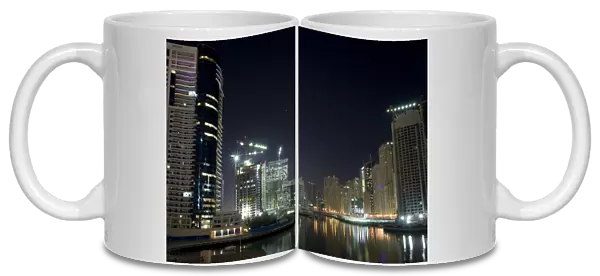 United Arab Emirates, Dubai. Towers on marina at night