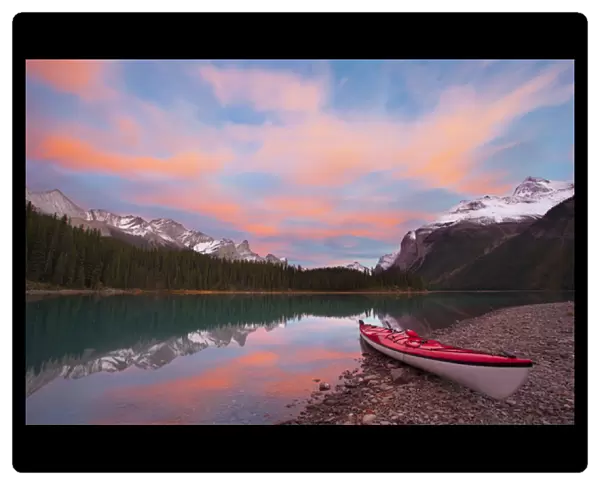 Canada, Alberta, Jasper National Park. A kayak on the shore of Maligne Lake, largest