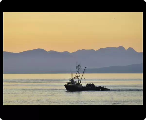 Fishing boat seen at sunset from Vancouver  /  Nanaimo Ferry