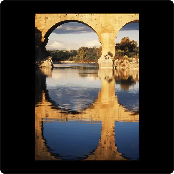 France, Languedoc, Gard, View of Pont du Gard bridge with Gardon river