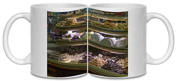 Europe, Italy, Venice. Glass display case filled with pastries and cookies. Credit as