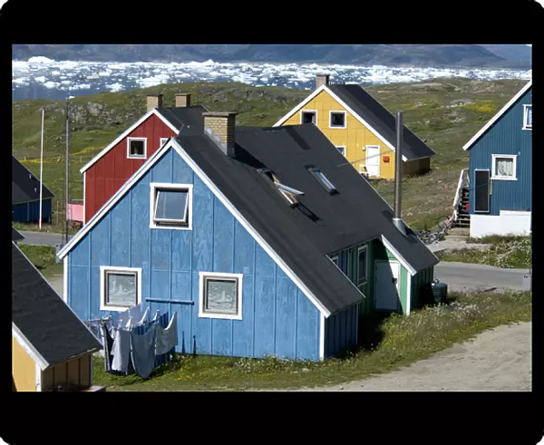 Greenland, Narsaq. The colorful cottages of the town of Narsaq line Qajaq Harbor