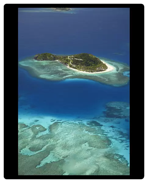 Matamanoa Island and coral reef, Mamanuca Islands, Fiji, South Pacific - aerial