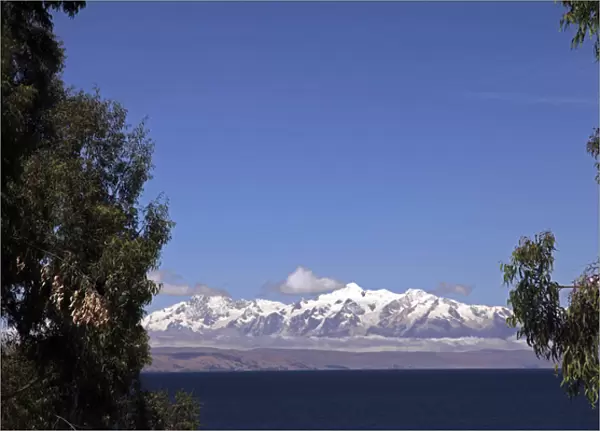 South America, Bolivia, Sun Island. View of the Royal Range of the Andes from Sun Island