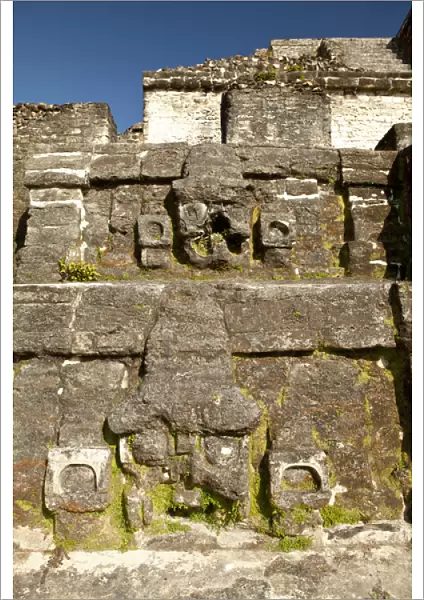 Craving on side of ruin. Located 30 miles from Belize City, Altun Ha is a Mayan site