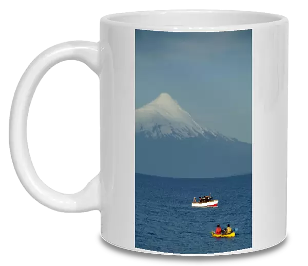 South America, Chile, Puerto Varas. Boats on Llanquihue Lake with the Osorno Volcano