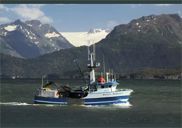 Fishing Boat in Kachemak Bay; Homer; Alaska; USA; with Kenai Mountains in the Background