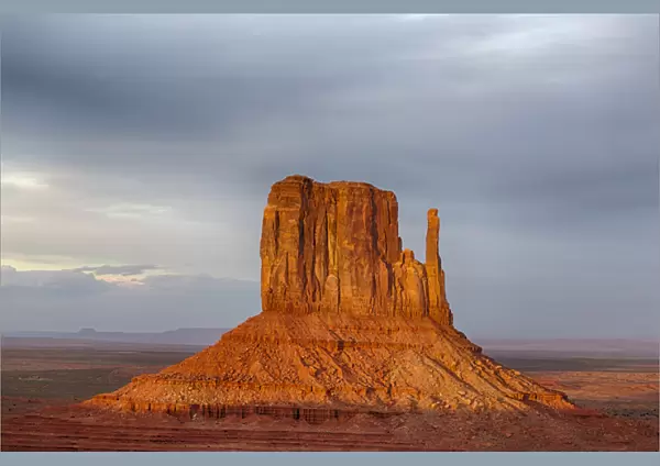 AZ, Monument Valley, West Mitten and storm clouds