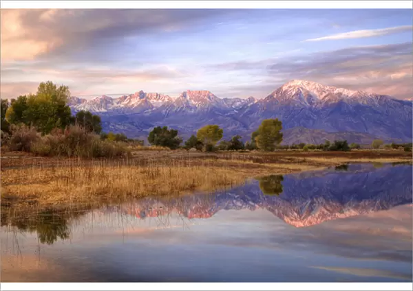 USA, California, Bishop. View of Sierra Mountains from Farmers Pond at sunrise. Credit as