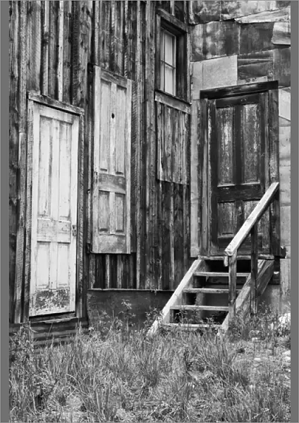 USA, Colorado, St. Elmo. Weathered doors in wood building