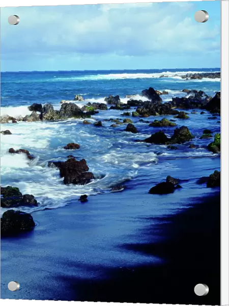 USA; Hawaii, Hawaii; Waves breaking on a black sand beach