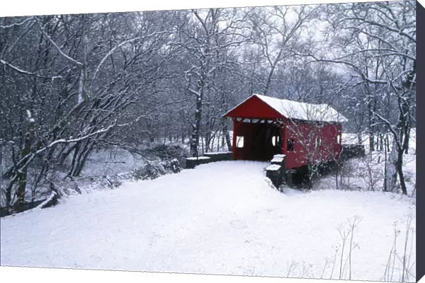 USA, Pennsylvania, Mariana County. Hughes Covered Bridge in winter