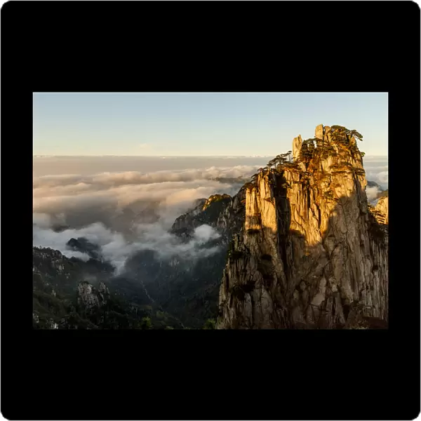 Mountain peaks and mist from above at sunrise, Yellow Mountain or Huangshan