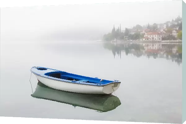 Europe, Montenegro, Kotar. Small boat on calm water