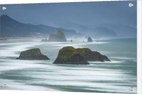 USA, Oregon, Cannon Beach. Long exposure of beach and sea stacks