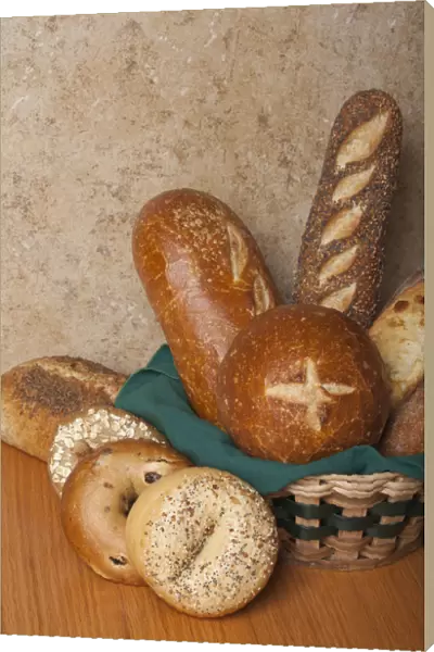 Variety of homemade breads. Sourdough bread bowl, sourdough loaf, three seed loaf