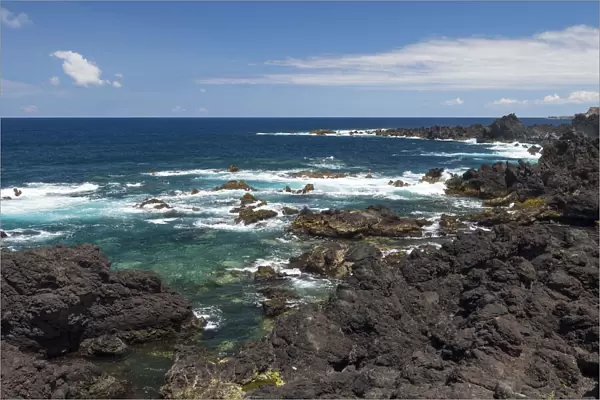 Coast with lava flow and beach near Biscoitos. Terceira Island, Azores, Portugal