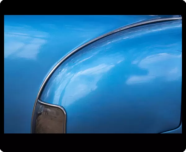 Detail of rear fender on classic blue American Chevrolet in Vinales, Vinales Valley, Cuba