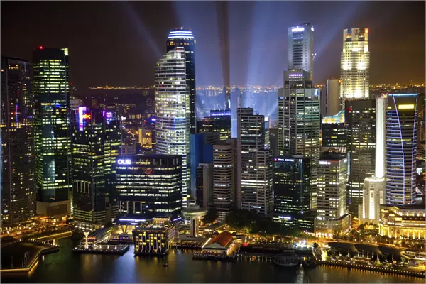 Singapore. Searchlights and city building at night