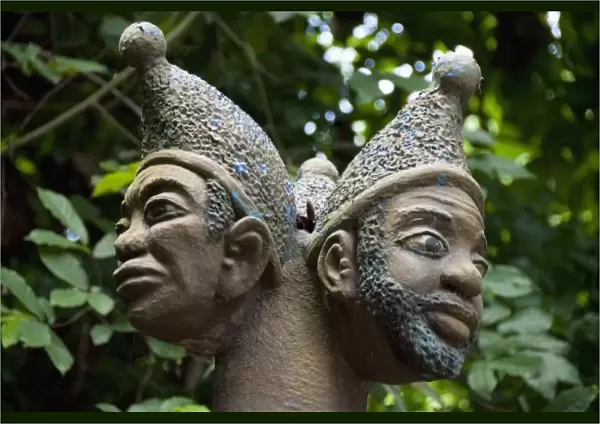 Statue of 3-headed voodoo deity in Sacred Forest of Kapasse, Ouidah, Benin