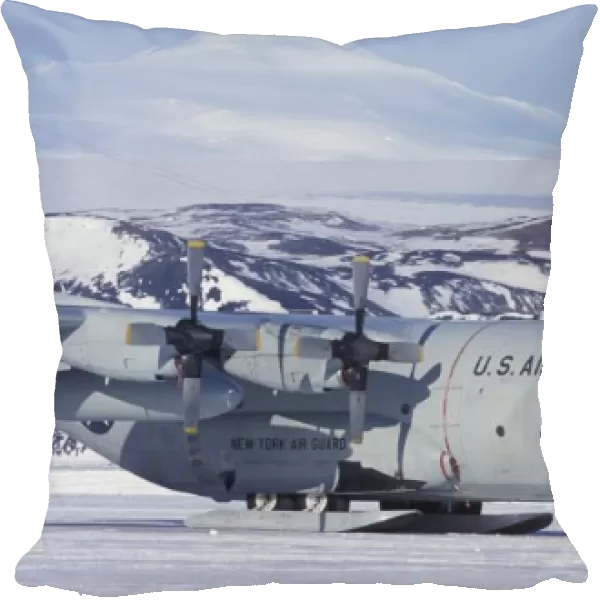 Antarctica, Ross Island, McMurdo station, C-130 Hercules on ice runway, Mt. Erebus beyond