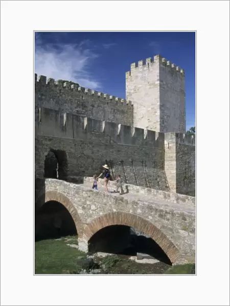 Portugal, Lisbon, Mother and children cross over moat to Castelo (castle) de Sao Jorge