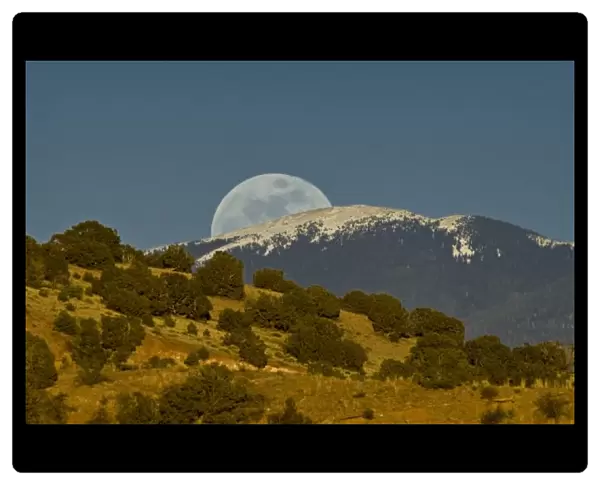 Moonrise over the Sangre de Cristo Mountains, New Mexico, USA