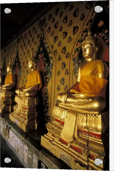 Asia, Thailand, Bangkok. Wat Arun (Temple of Dawn), gallery of golden buddhas