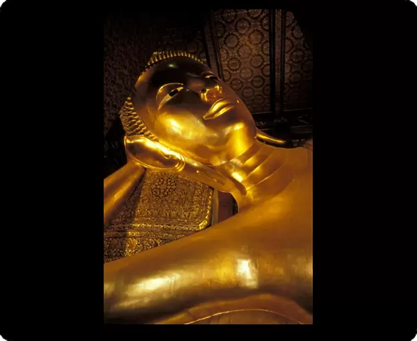 Asia, Thailand, Bangkok. Wat Po, golden reclining Buddha