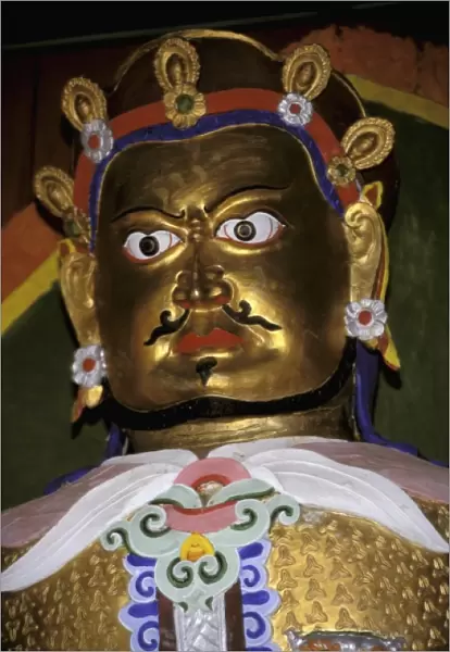 Asia, China, Yunnan Province, Lijiang. Yufeng Monastery, colorful statue of Chinese
